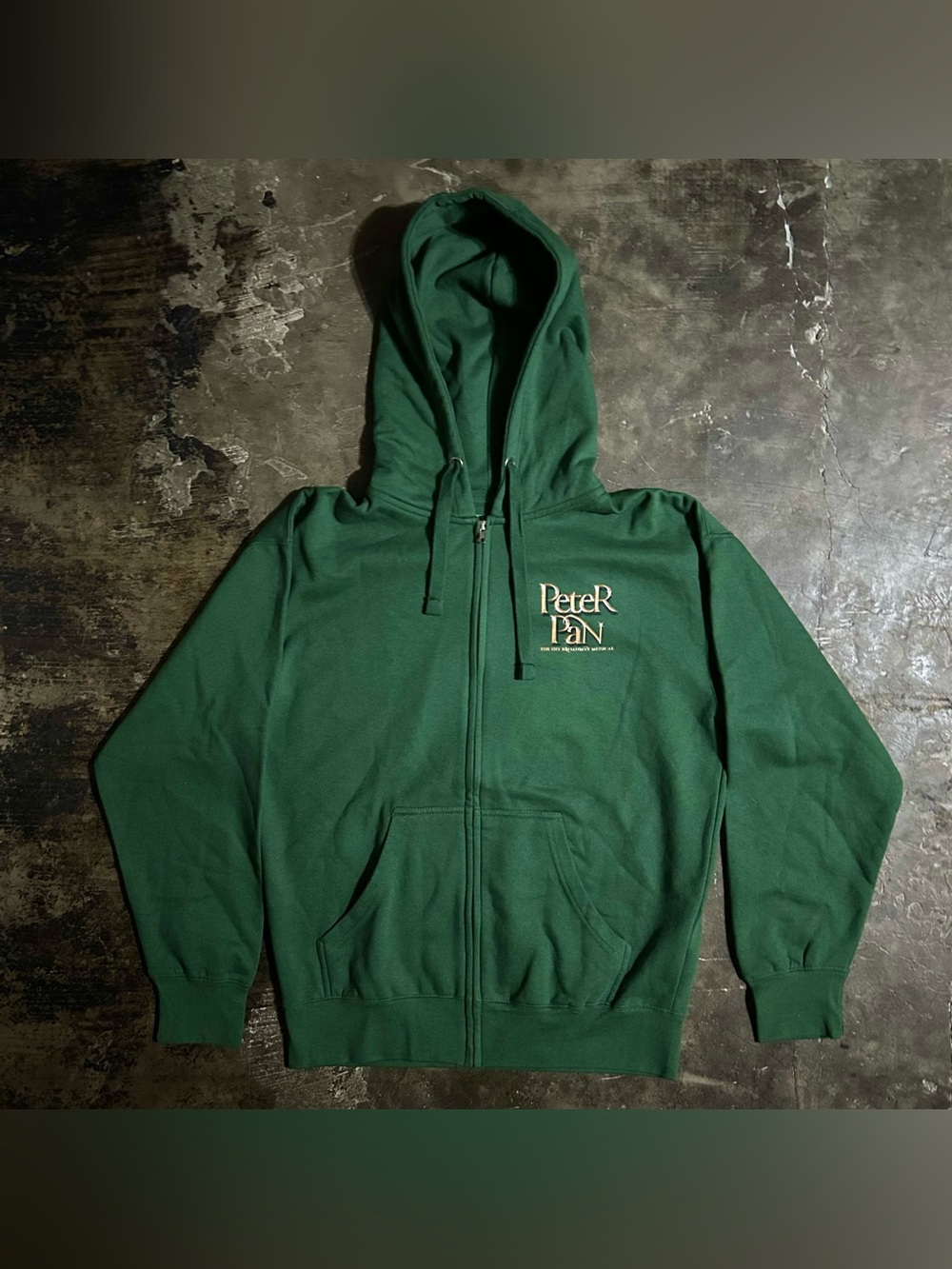 LARGE Peter Pan: The High-Flying Broadway Musical" zip-up hoodie